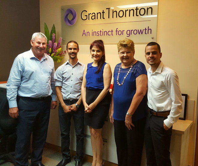 Spotlight_TSM_GrantThornton_660x553px.jpg Jesse with staff at Grant Thornton's office
