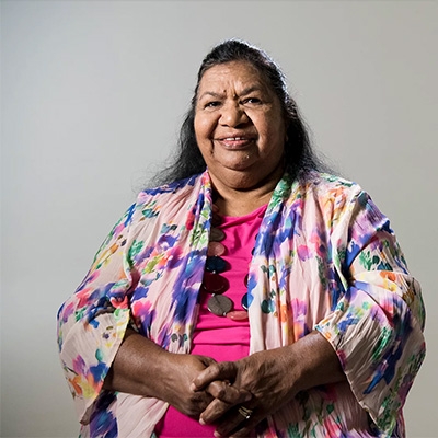 A woman smiling at the camera