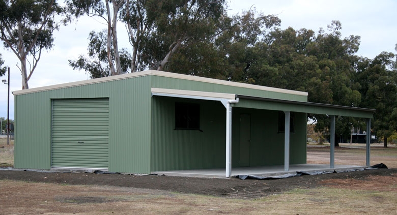 A green shed with a verandah