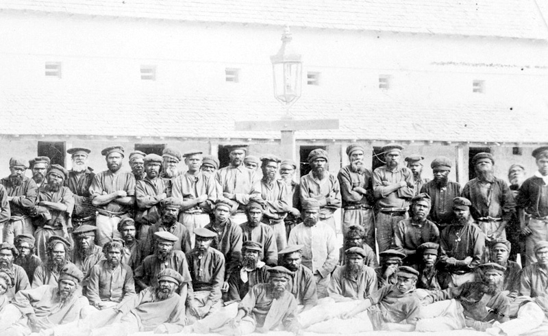 A large group of people outside a building