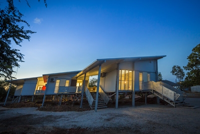 A building with its internal lights on
