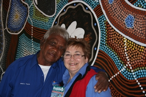 A man and a woman with their arms around each other