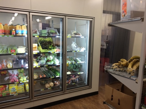 Fridge cabinets with groceries inside