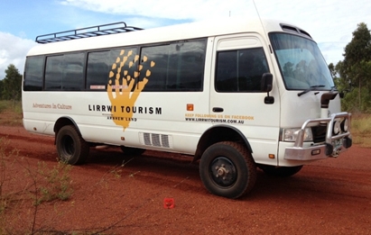 A bus with the corporation's name on the side