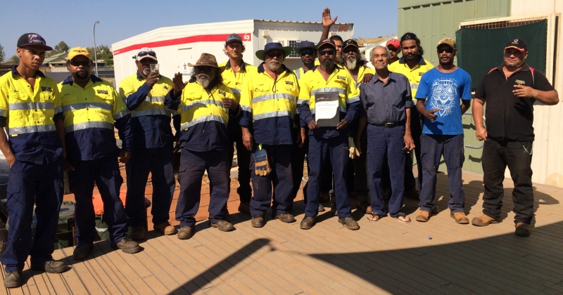 A group of people wearing hi vis